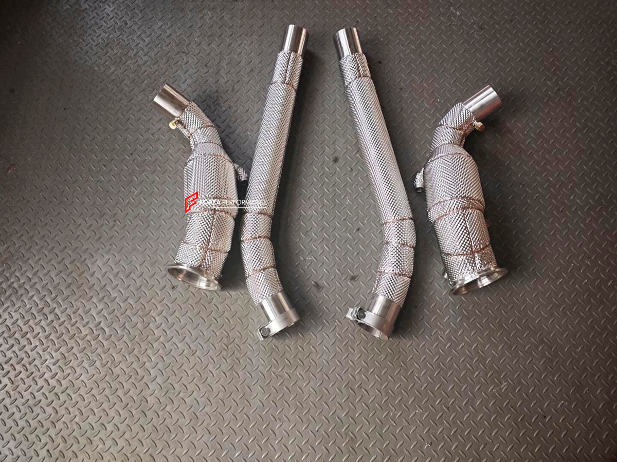EXHAUST MANIFOLD DOWNPIPE for FERRARI PUROSANGUE V12 6.5 2022+ FORZA PERFORMANCE Custom Fit

Set includes:

Manifold Downpipes
Connecting Pipes
Material: Stainless Steel (Can be made of Titanium)

Production time: 10–15 days
