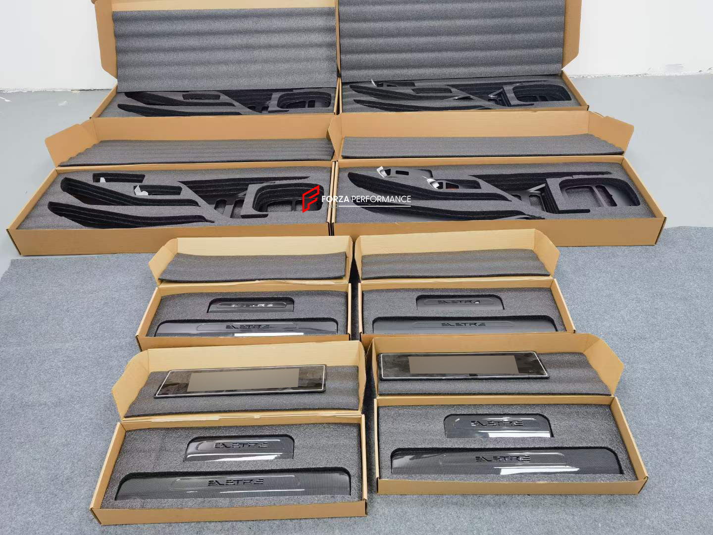 DRY CARBON INTERIOR KIT for LOTUS ELETRE  Set includes:  Front Doors Panel Covers Rear Doors Panel Covers Window Switch Covers Center Console Box Cover Light Frame Control Panel Cover Door Seals