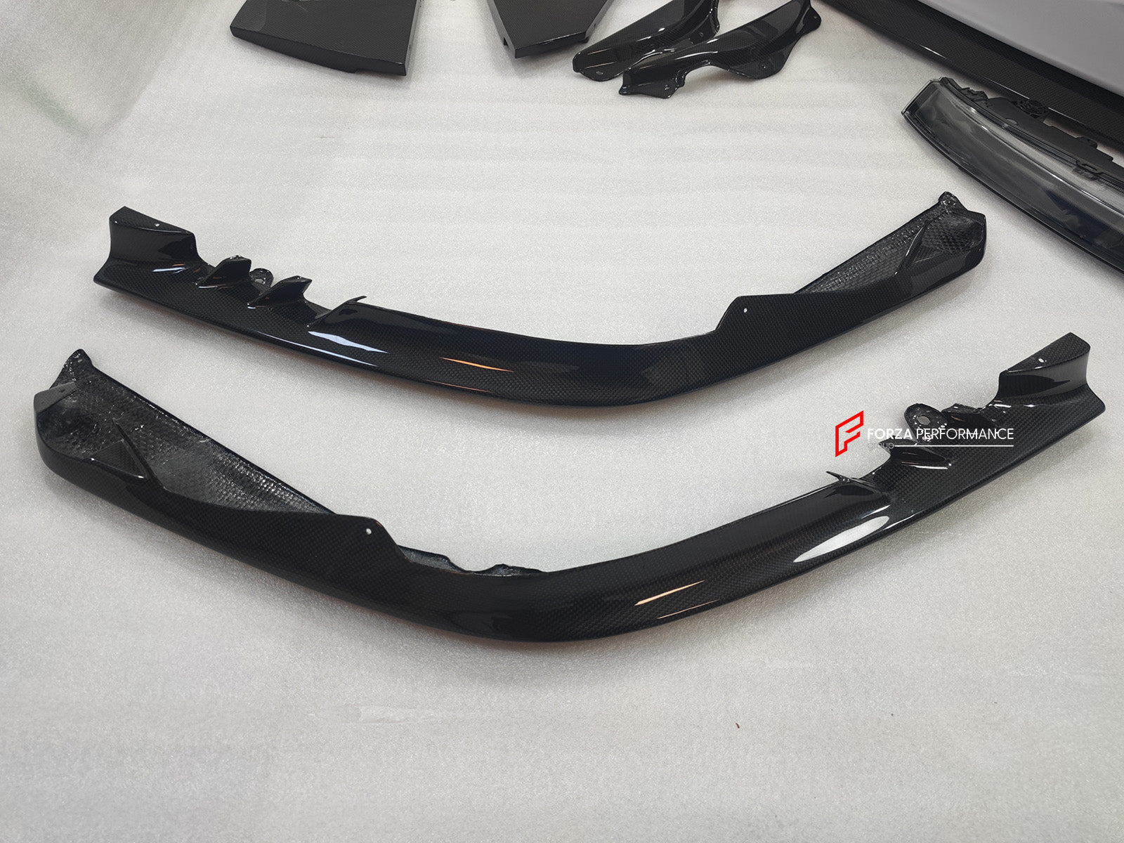 CARBON OEM GENUINE PARTS for FERRARI SF90 2021+

Set includes:

Front Lip
Front Trims
Side Skirts
Side Vents
Rear Diffuser
Rear Spoiler Wing

Material: Carbon Fiber

NOTE: Professional installation is required.