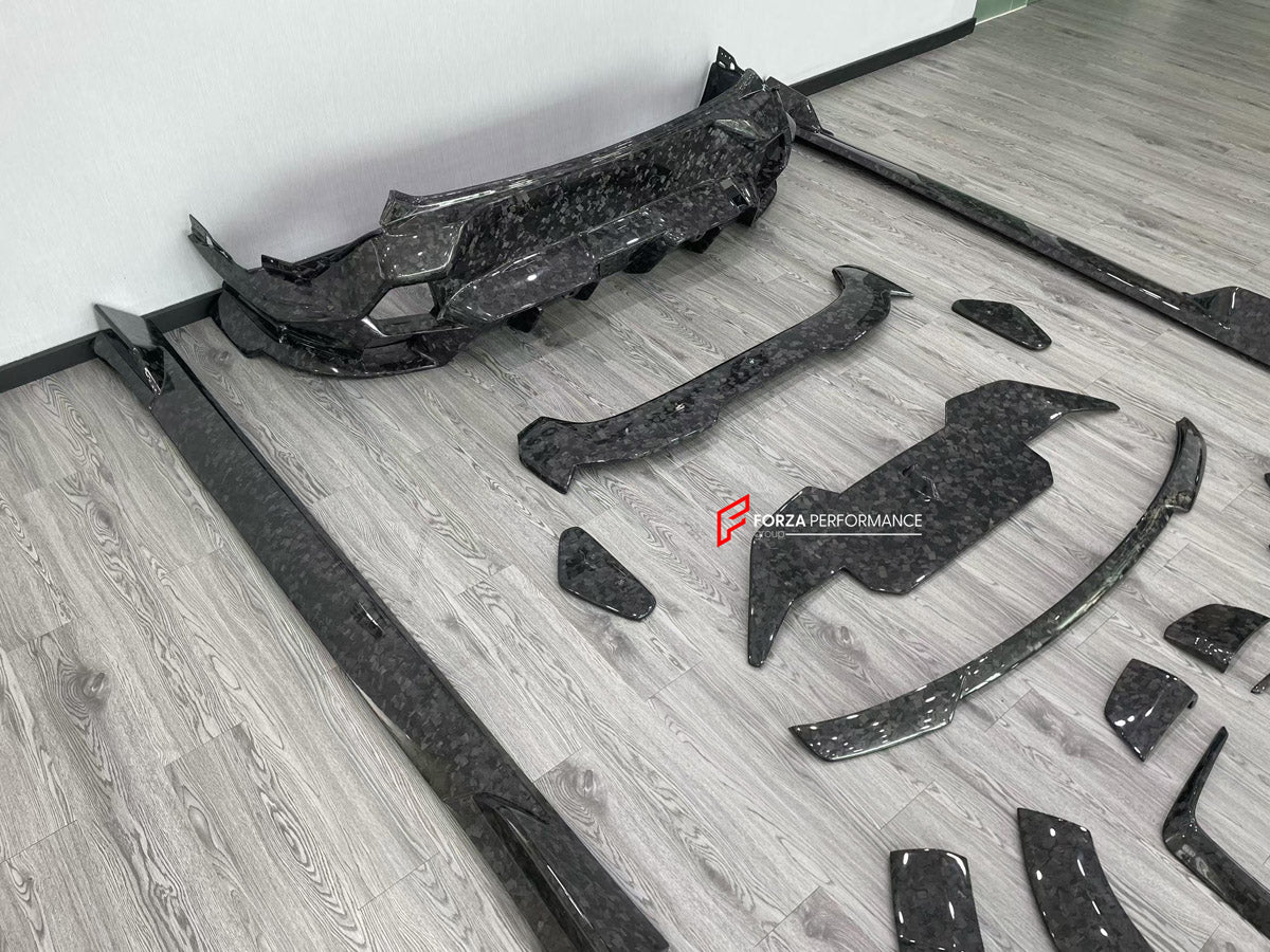 FORGED CARBON BODY KIT for BMW XM G09 2023+ FORZA PERFORMANCE custom fit Mansory Style

Set includes:
Front Lip
Headlight Covers
Hood Bonnet
Fender Flares
Body Side Door Moldings
Side Skirts
Roof Spoiler
Ducktail Spoiler
Rear Bumper Assembly
Rear Diffuser

Material: Forged Carbon

NOTE: Professional installation is required.
