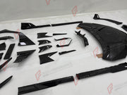 FORGED CARBON BODY KIT for LAMBORGHINI REVUELTO 2023+ FORZA PERFORMANCE custom fit Mansory Style

Set includes:
Front Lip
Front Bumper Canards
Hood Bonnet
Side Mirror Covers
Side Skirts
Side Air Intake Trims
Rear Bumper Trims
Rear Diffuser
Rear Wing Spoiler

Material: Forged Carbon

NOTE: Professional installation is required.