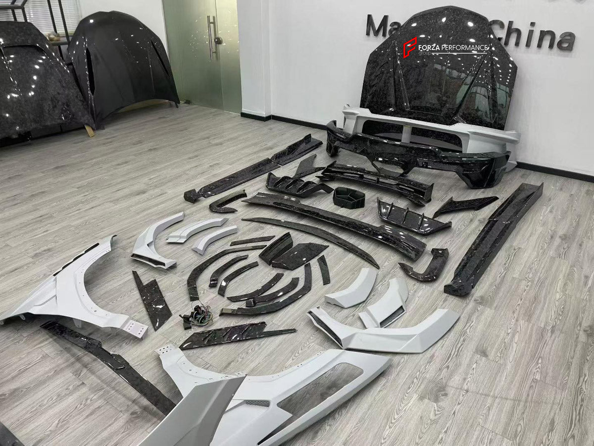 FORGED CARBON BODY KIT for LAMBORGHINI URUS SE 2024+ FORZA PERFORMANCE custom fit M Style

Set includes:
Front Lip
Front Bumper Assembly
Hood Bonnet
Front Fenders
Fender Flares
Side Skirts
Rear Spoiler Wing
Rear Bumper Assembly
Rear Diffuser

Material: Forged Carbon, Plastic

NOTE: Professional installation is required.
