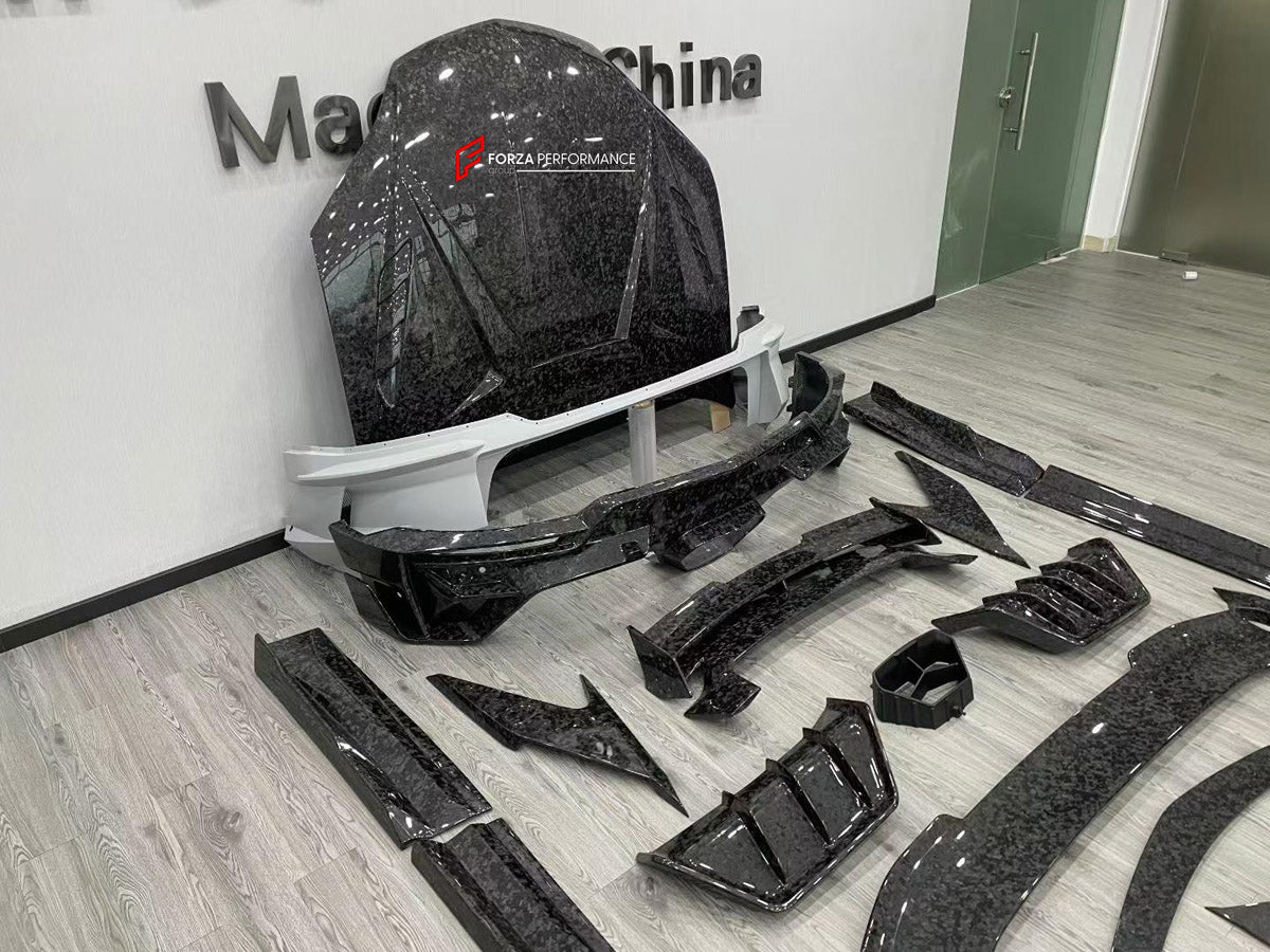 FORGED CARBON BODY KIT for LAMBORGHINI URUS SE 2024+ FORZA PERFORMANCE custom fit M Style

Set includes:
Front Lip
Front Bumper Assembly
Hood Bonnet
Front Fenders
Fender Flares
Side Skirts
Rear Spoiler Wing
Rear Bumper Assembly
Rear Diffuser

Material: Forged Carbon, Plastic

NOTE: Professional installation is required.