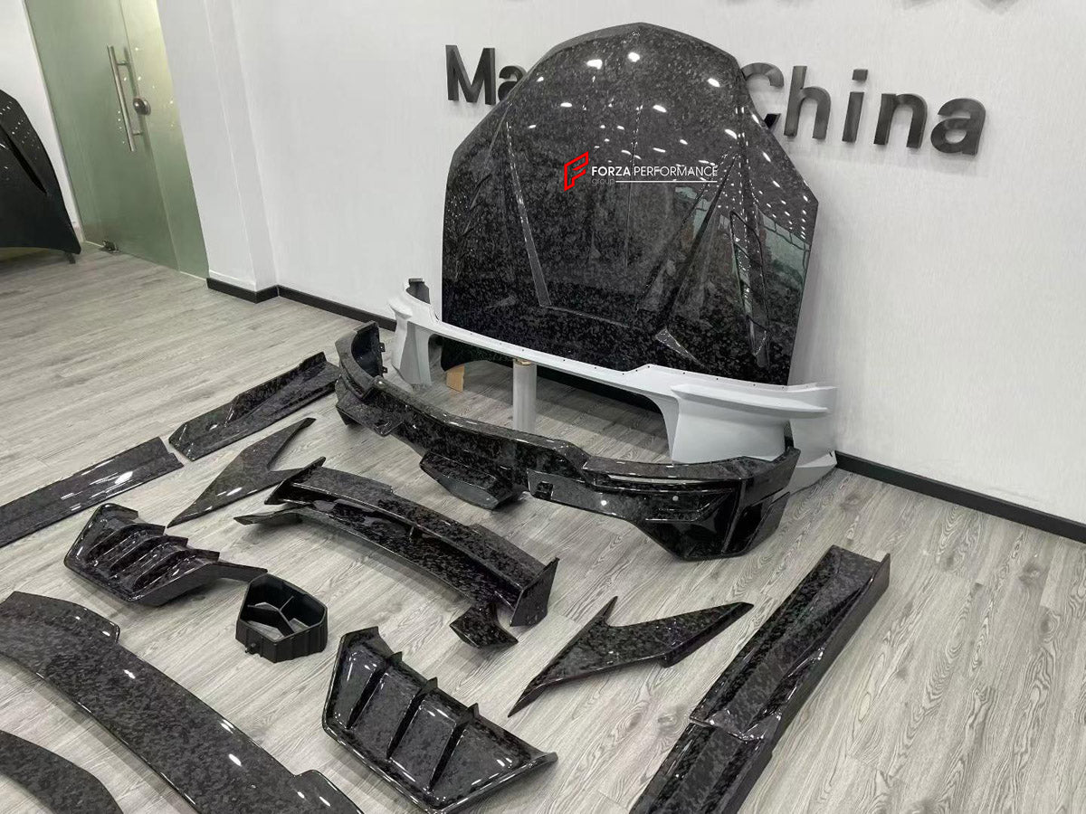 FORGED CARBON BODY KIT for LAMBORGHINI URUS SE 2024+ FORZA PERFORMANCE custom fit M Style

Set includes:
Front Lip
Front Bumper Assembly
Hood Bonnet
Front Fenders
Fender Flares
Side Skirts
Rear Spoiler Wing
Rear Bumper Assembly
Rear Diffuser

Material: Forged Carbon, Plastic

NOTE: Professional installation is required.