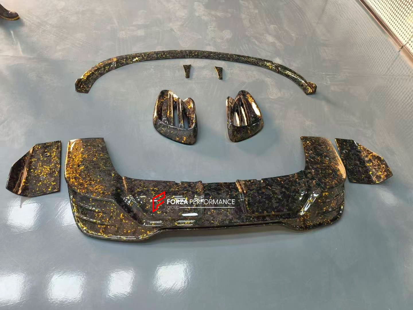 FORGED CARBON BODY KIT for MERCEDES BENZ EQS V297 2021+ EQE V295 2022+

Set includes:

Front Lip
Front Bumper Air Vents
Front Bumper Canards
Rear Diffuser

Material: Forged Carbon

NOTE: Professional installation is required.