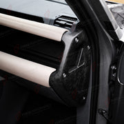 FORGED CARBON FIBER INTERIOR TRIM KIT for LAND ROVER DEFENDER 110 L663 2020+
Set includes:

Dashboard Air Vent Trims
Dashboard End Cap Trims
Dashboard Cover Trim
Gear Shift Panel Trim
Center Console Panel Trim
Door Grab Handle Trims
Small Trim Strips
Material: Forged Carbon Fiber

NOTE: Professional installation is required.