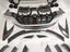 FORGED CARBON WIDE BODY KIT for FERRARI PUROSANGUE 2023+ FORZA PERFORMANCE custom fit Mansory Style

Set includes:
Front Bumper
Front Lip
Hood Bonnet
Front Fender Trims
Fender Flares
Side Skirts
Rear Bumper
Rear Diffuser
Rear Wing Spoiler
Exhaust Tips

Material: Forged Carbon

NOTE: Professional installation is required.