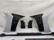 FORGED CARBON WIDE BODY KIT for FERRARI PUROSANGUE 2023+ FORZA PERFORMANCE custom fit Mansory Style

Set includes:
Front Bumper
Front Lip
Hood Bonnet
Front Fender Trims
Fender Flares
Side Skirts
Rear Bumper
Rear Diffuser
Rear Wing Spoiler
Exhaust Tips

Material: Forged Carbon

NOTE: Professional installation is required.