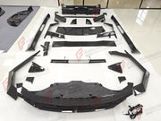 DRY CARBON WIDE BODY KIT for TESLA CYBERTRUCK 2023+ FORZA PERFORMANCE custom fit Mansory Style

Set includes:
Front Bumper with DRL Light Bar
Front Panel
Hood Bonnet
Roof Panel
Roof LED Bar
Fender Flares
Side Mirror Covers
Side Skirts
C Pillar Panels
Window Trims
Trunk Panel
Rear Spoiler
Rear Panel
Rear Diffuser

Material: Dry Carbon

NOTE: Professional installation is required.