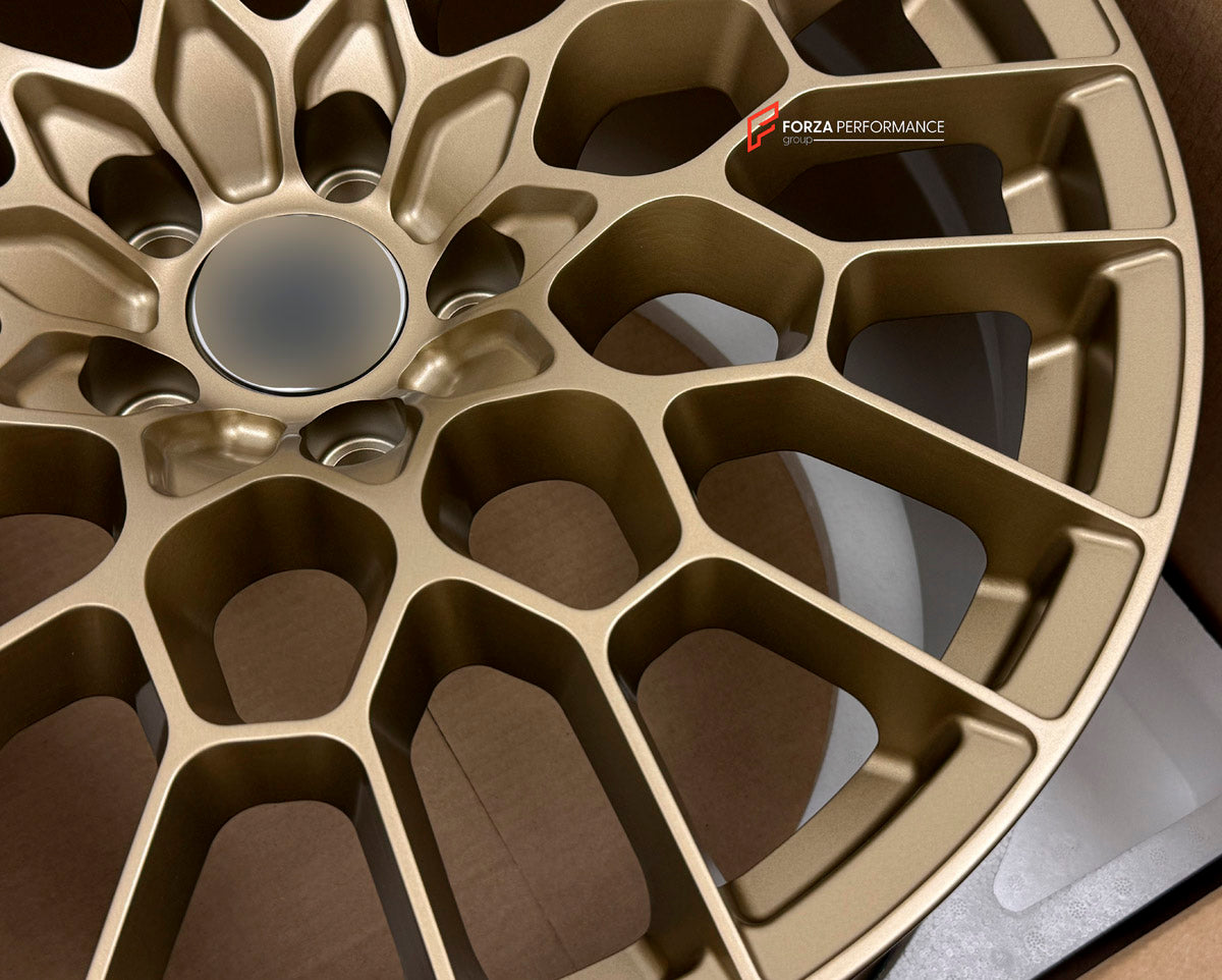 We manufactured premium quality forged wheels rims for our client's Asron Martin DB9 2004 - 2016 with the following specifications:

WHEEL SIZE:

Front: 20 x 8.5 ET 42
Rear: 20 x 11 ET 54
PCD: 5 x 114.3
CB: 68.1
Finish: Satin Light Gold
Material: 6061-T6 Forged Aluminum
THIS WHEEL DESIGN CAN BE CUSTOM-MADE FOR YOUR CAR IN ANY SIZE AND COLOR OPTIONS
Available in monoblock, 2-piece, 3-piece, duoblock, beadlock
3D wheel renderings are provided according to the exact dimensions and specifications requested by t