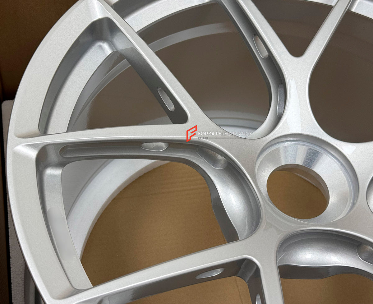 We manufactured premium quality forged wheels rims for our client's Porsche 911 991.2 GT3 2015 - 2020 with the following specifications:

WHEEL SIZE:

Front: 20 x 9 ET 52
Rear: 20 x 12 ET 44
PCD: 5 x 130
CB: 71.6
Finish: Gloss Silver
Material: 6061-T6 Forged Aluminum
THIS WHEEL DESIGN CAN BE CUSTOM-MADE FOR YOUR CAR IN ANY SIZE AND COLOR OPTIONS
Available in monoblock, 2-piece, 3-piece, duoblock, beadlock
3D wheel renderings are provided according to the exact dimensions and specifications requested by the 