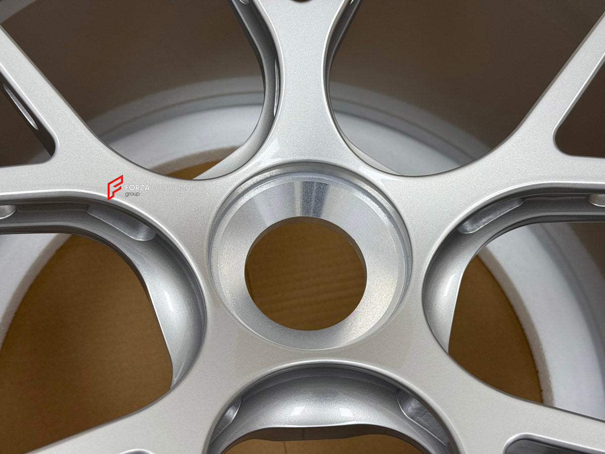 We manufactured premium quality forged wheels rims for our client's Porsche 911 991.2 GT3 2015 - 2020 with the following specifications:

WHEEL SIZE:

Front: 20 x 9 ET 52
Rear: 20 x 12 ET 44
PCD: 5 x 130
CB: 71.6
Finish: Gloss Silver
Material: 6061-T6 Forged Aluminum
THIS WHEEL DESIGN CAN BE CUSTOM-MADE FOR YOUR CAR IN ANY SIZE AND COLOR OPTIONS
Available in monoblock, 2-piece, 3-piece, duoblock, beadlock
3D wheel renderings are provided according to the exact dimensions and specifications requested by the 