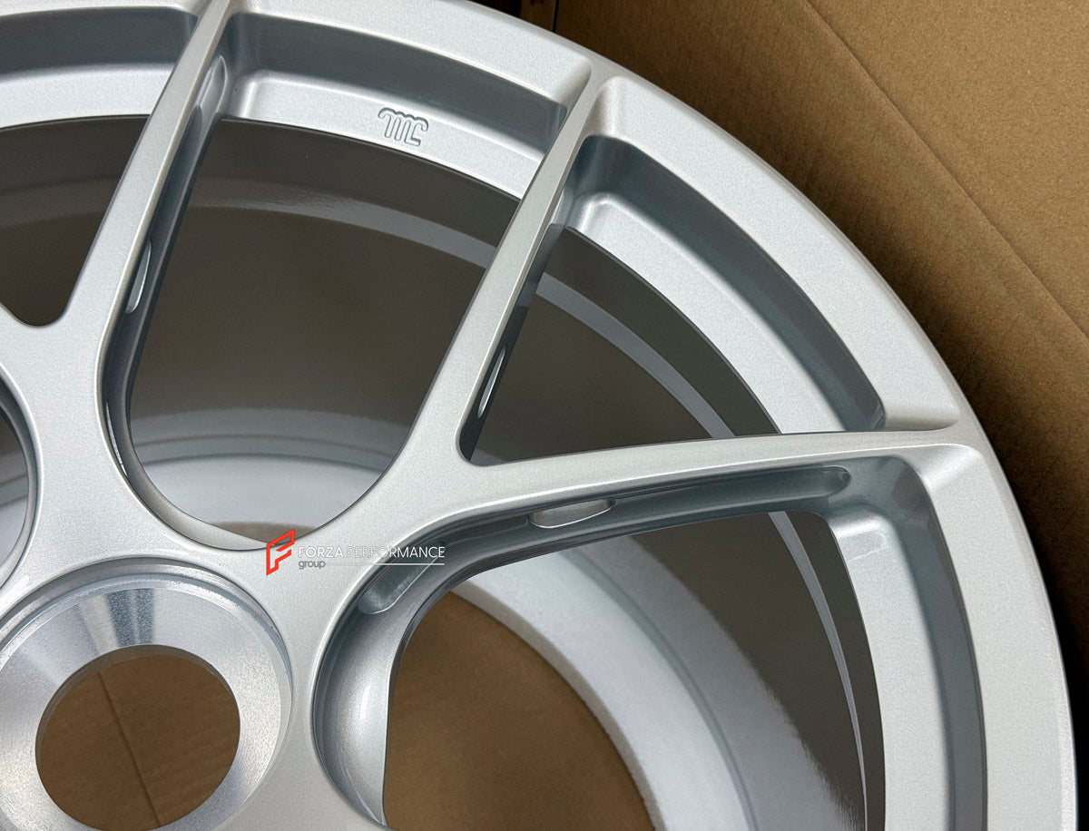 We manufactured premium quality forged wheels rims for our client's Porsche 911 991.2 GT3 2015 - 2020 with the following specifications:

WHEEL SIZE:

Front: 20 x 9 ET 52
Rear: 20 x 12 ET 44
PCD: 5 x 130
CB: 71.6
Finish: Gloss Silver
Material: 6061-T6 Forged Aluminum
THIS WHEEL DESIGN CAN BE CUSTOM-MADE FOR YOUR CAR IN ANY SIZE AND COLOR OPTIONS
Available in monoblock, 2-piece, 3-piece, duoblock, beadlock
3D wheel renderings are provided according to the exact dimensions and specifications requested by the 