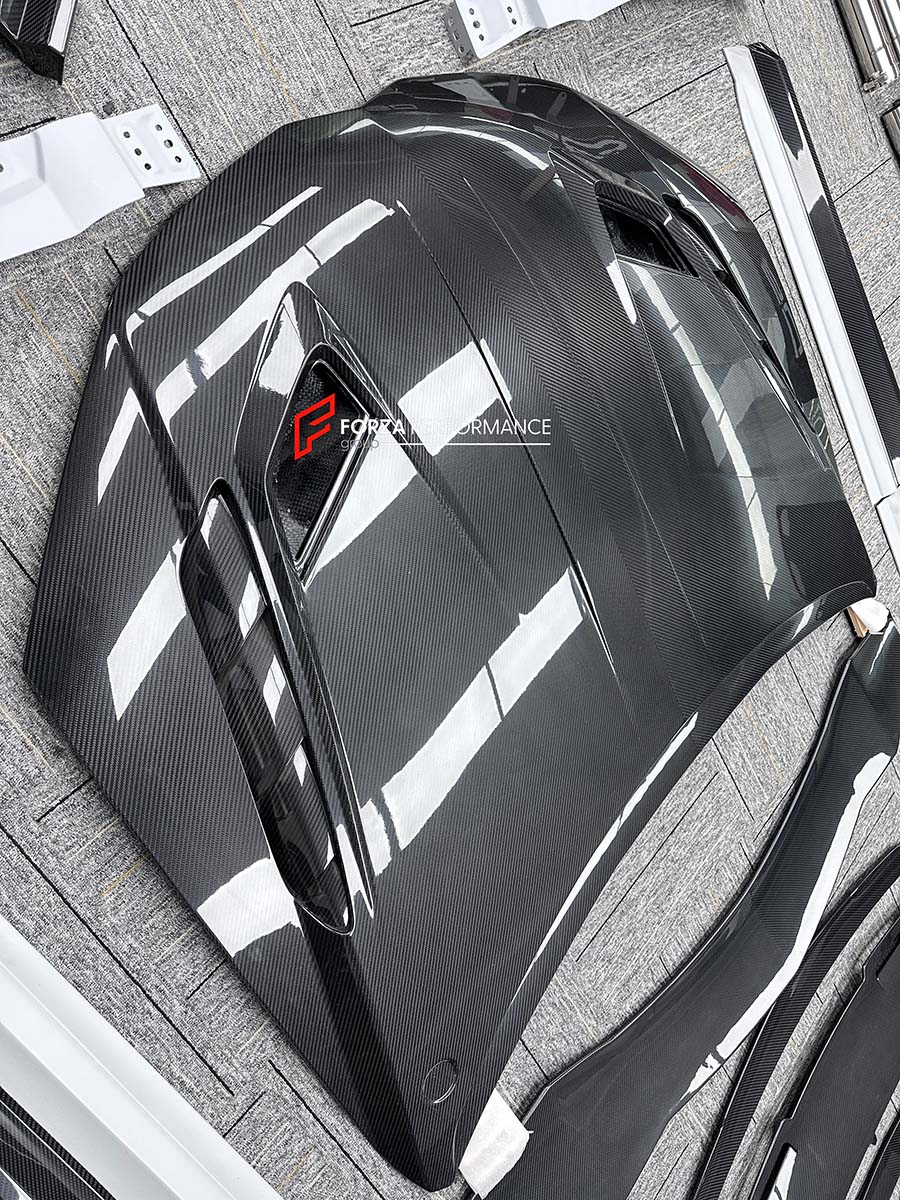CARBON BODY KIT for LAMBORGHINI URUS S PERFORMANTE

Set includes:

Front Bumper 
Hood
Side Fenders
Side Skirts
Roof Spoiler
Rear Spoiler
Rear Bumper
Exhaust Tips
Exhaust System

Material: Carbon Fiber

Note: Professional installation is required.
