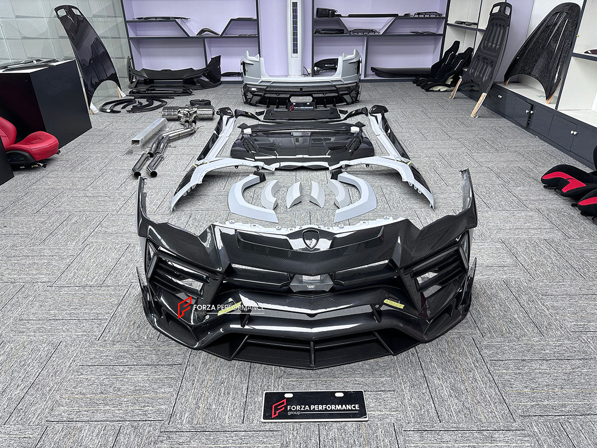 CARBON BODY KIT for LAMBORGHINI URUS S PERFORMANTE

Set includes:

Front Bumper 
Hood
Side Fenders
Side Skirts
Roof Spoiler
Rear Spoiler
Rear Bumper
Exhaust Tips
Exhaust System

Material: Carbon Fiber

Note: Professional installation is required.
