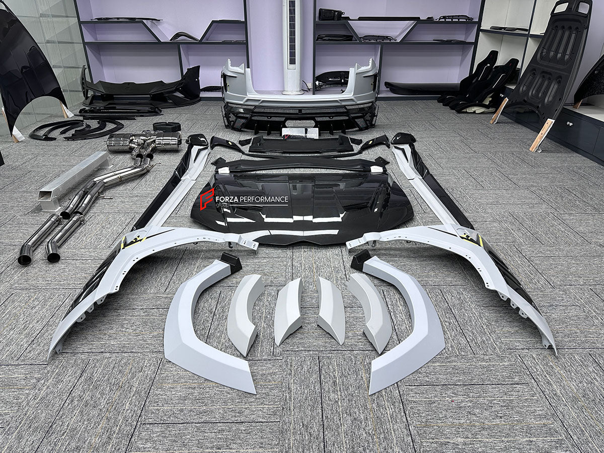 CARBON BODY KIT for LAMBORGHINI URUS S PERFORMANTE

Set includes:

Front Bumper 
Hood
Side Fenders
Side Skirts
Roof Spoiler
Rear Spoiler
Rear Bumper
Exhaust Tips
Exhaust System

Material: Carbon Fiber

Note: Professional installation is required.
