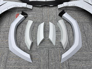 CARBON BODY KIT for LAMBORGHINI URUS S PERFORMANTE

Set includes:

Front Bumper 
Hood
Side Fenders
Side Skirts
Roof Spoiler
Rear Spoiler
Rear Bumper
Exhaust Tips
Exhaust System

Material: Carbon Fiber

Note: Professional installation is required.
