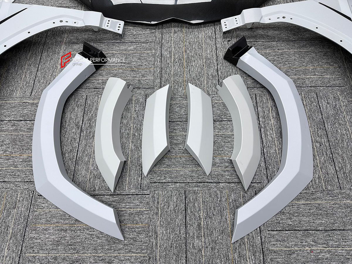 CARBON BODY KIT for LAMBORGHINI URUS S PERFORMANTE

Set includes:

Front Bumper 
Hood
Side Fenders
Side Skirts
Roof Spoiler
Rear Spoiler
Rear Bumper
Exhaust Tips
Exhaust System

Material: Carbon Fiber

Note: Professional installation is required.
