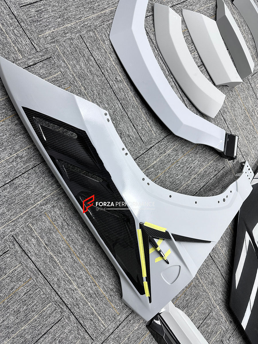 CARBON BODY KIT for LAMBORGHINI URUS S PERFORMANTE

Set includes:

Front Bumper 
Hood
Side Fenders
Side Skirts
Roof Spoiler
Rear Spoiler
Rear Bumper
Exhaust Tips
Exhaust System

Material: Carbon Fiber

Note: Professional installation is required.
