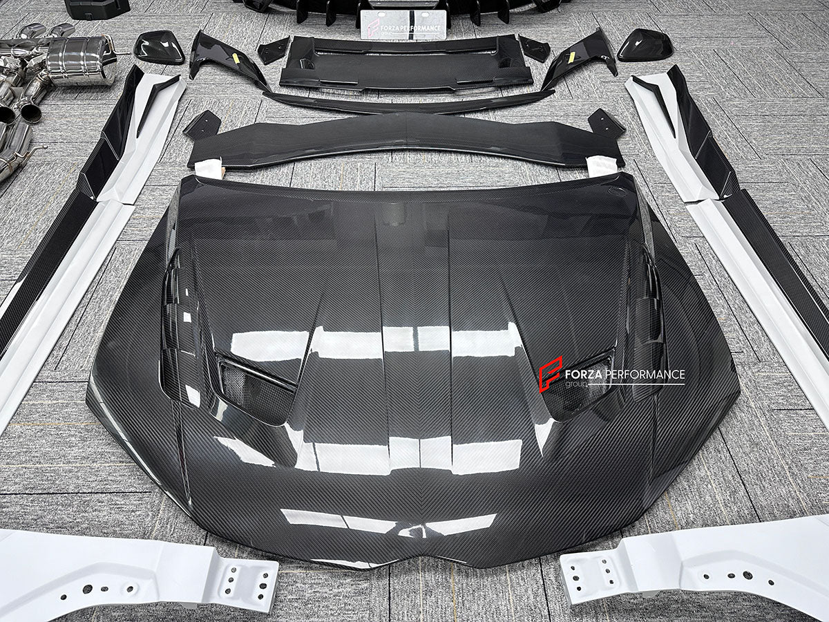 CARBON BODY KIT for LAMBORGHINI URUS S PERFORMANTE

Set includes:

Front Bumper 
Hood
Side Fenders
Side Skirts
Roof Spoiler
Rear Spoiler
Rear Bumper
Exhaust Tips
Exhaust System

Material: Carbon Fiber

Note: Professional installation is required.
