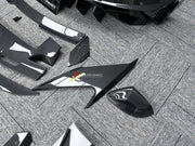 CARBON BODY KIT for LAMBORGHINI URUS S PERFORMANTE

Set includes:

Front Bumper 
Hood
Side Fenders
Side Skirts
Roof Spoiler
Rear Spoiler
Rear Bumper
Exhaust Tips
Exhaust System

Material: Carbon Fiber

Note: Professional installation is required.
