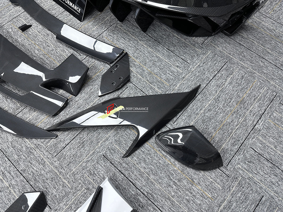CARBON BODY KIT for LAMBORGHINI URUS S PERFORMANTE

Set includes:

Front Bumper 
Hood
Side Fenders
Side Skirts
Roof Spoiler
Rear Spoiler
Rear Bumper
Exhaust Tips
Exhaust System

Material: Carbon Fiber

Note: Professional installation is required.

