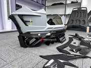 CARBON BODY KIT for LAMBORGHINI URUS S PERFORMANTE

Set includes:

Front Bumper 
Hood
Side Fenders
Side Skirts
Roof Spoiler
Rear Spoiler
Rear Bumper
Exhaust Tips
Exhaust System

Material: Carbon Fiber

Note: Professional installation is required.
