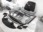DRY CARBON WIDE BODY KIT for BENTLEY CONTINENTAL GT GTC 2018 - 2024

Set includes:
Front Lip
Front Bumper
Front Bumper Trims
Grille
Hood / Bonnet
Front Fenders
Side Mirror Covers
Side Trims
Side Skirts
Folding Roof Cover
Rear Spoiler
Rear Bumper
Rear Diffuser

Material: Dry Carbon

Note: Professional installation is required.