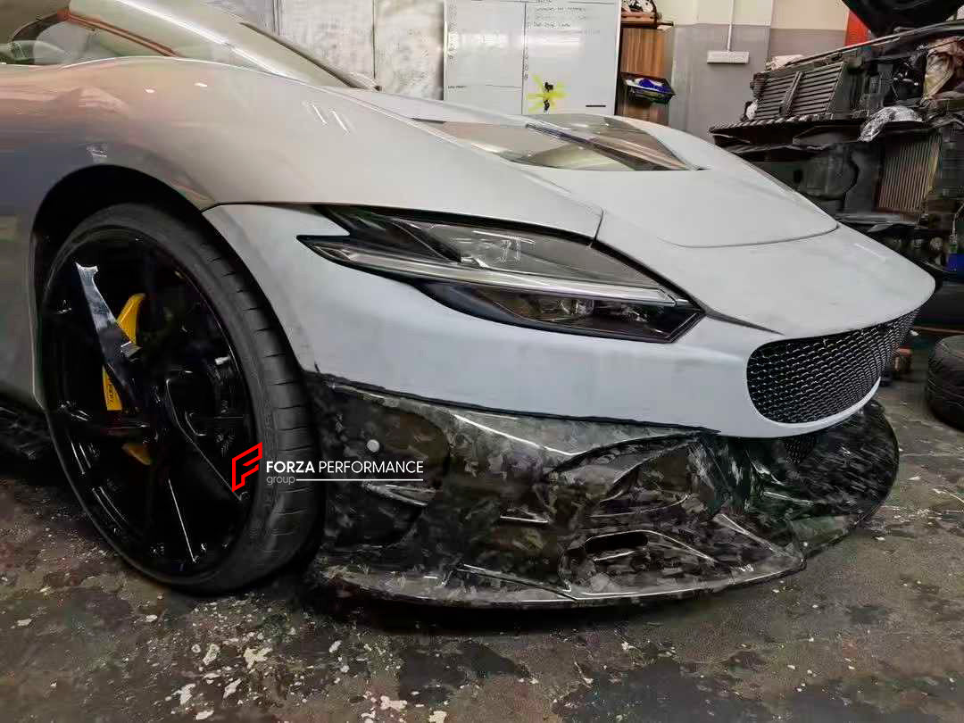 CARBON BODY KIT for FERRARI ROMA

Set includes:

Front Bumper
Front Grille
Hood / Bonnet
Side Mirror Covers
Side Trims
Side Skirts
Trunk Panel
Rear Spoiler

Rear Diffuser

Material: Carbon Fiber

Note: Professional installation is required.