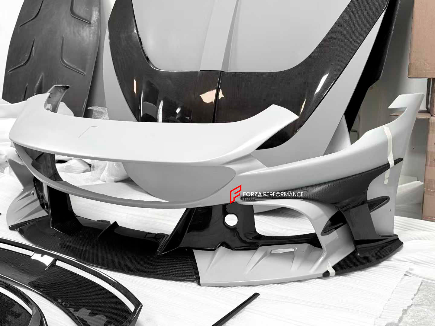 CARBON BODY KIT for FERRARI ROMA

Set includes:

Front Bumper
Front Grille
Hood / Bonnet
Side Mirror Covers
Side Trims
Side Skirts
Trunk Panel
Rear Spoiler

Rear Diffuser

Material: Carbon Fiber

Note: Professional installation is required.