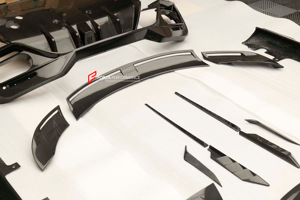 CARBON BODY KIT for FERRARI ROMA

Set includes:

Front Bumper
Front Grille
Hood / Bonnet
Side Mirror Covers
Side Trims
Side Skirts
Trunk Panel
Rear Spoiler

Rear Diffuser

Material: Carbon Fiber