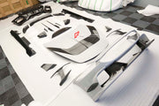 CARBON BODY KIT for FERRARI ROMA

Set includes:

Front Bumper
Front Grille
Hood / Bonnet
Side Mirror Covers
Side Trims
Side Skirts
Trunk Panel
Rear Spoiler

Rear Diffuser

Material: Carbon Fiber