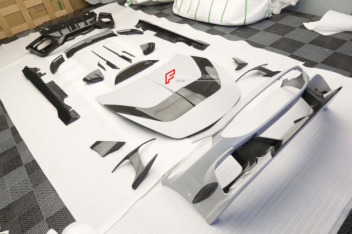CARBON BODY KIT for FERRARI ROMA

Set includes:

Front Bumper
Front Grille
Hood / Bonnet
Side Mirror Covers
Side Trims
Side Skirts
Trunk Panel
Rear Spoiler

Rear Diffuser

Material: Carbon Fiber