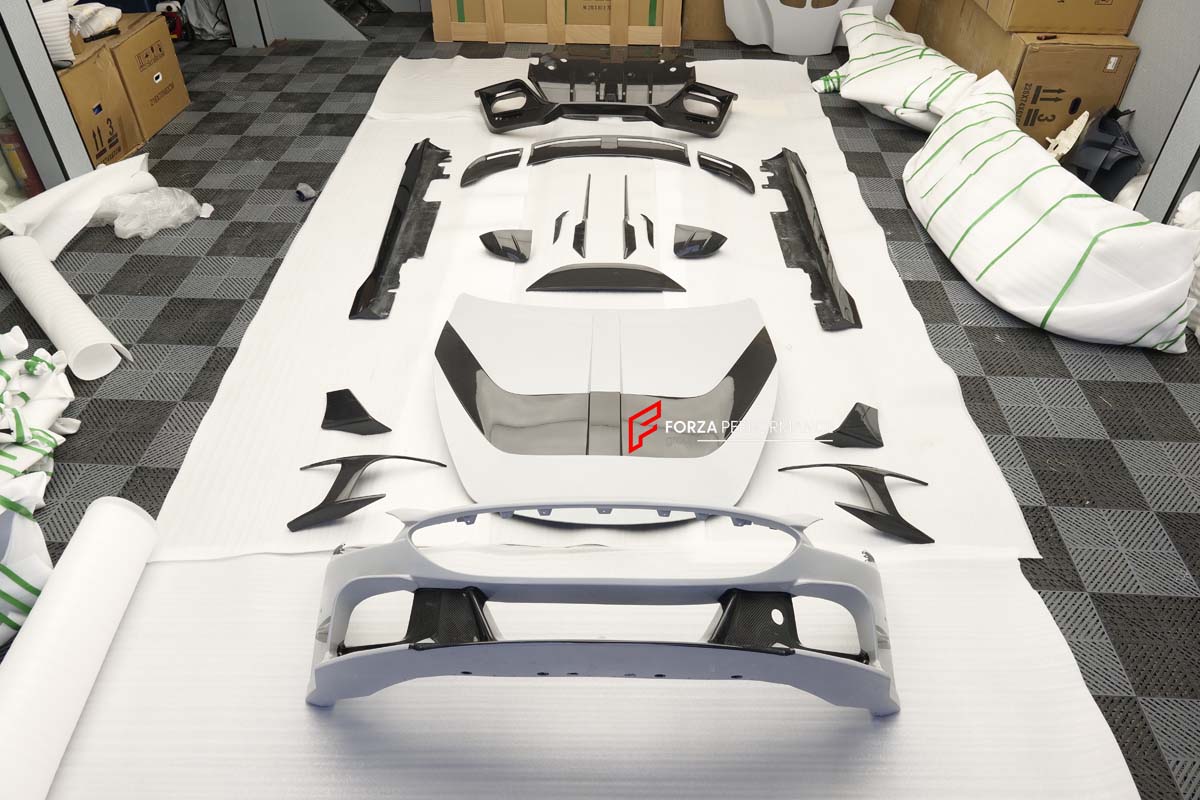 CARBON BODY KIT for FERRARI ROMA

Set includes:

Front Bumper
Front Grille
Hood / Bonnet
Side Mirror Covers
Side Trims
Side Skirts
Trunk Panel
Rear Spoiler

Rear Diffuser

Material: Carbon Fiber