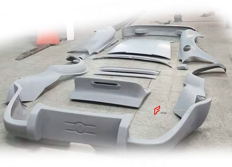 CONVERSION BODY KIT for PORSCHE 911 996 CARRERA 1997 - 2006 upgrade to 911 964

Set includes:

Front Bumper
Hood / Bonnet 
Headlights
Turn Lights
Front Fenders
Rear Quarter Panels
Rear Spoiler
Rear Bumper

Material: Fiberglass

NOTE: Professional installation is required.

CONTACT US FOR PRICING

Why “Contact Us for Pricing”?

We don’t display fixed prices because our goal is to offer you the most competitive deal possible. Product costs often decrease over time, and by requesting a quote, you’ll receive ou