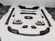 DRY CARBON BODY KIT for BMW 7 SERIES G70 2022+

Set includes:

Front Lip
Front Bumper Trims
Front Bumper Air Vent Covers
Side Mirror Covers
Side Trims
Side Skirts
Roof Spoiler
Rear Spoiler
Rear Diffuser

Material: Dry Carbon