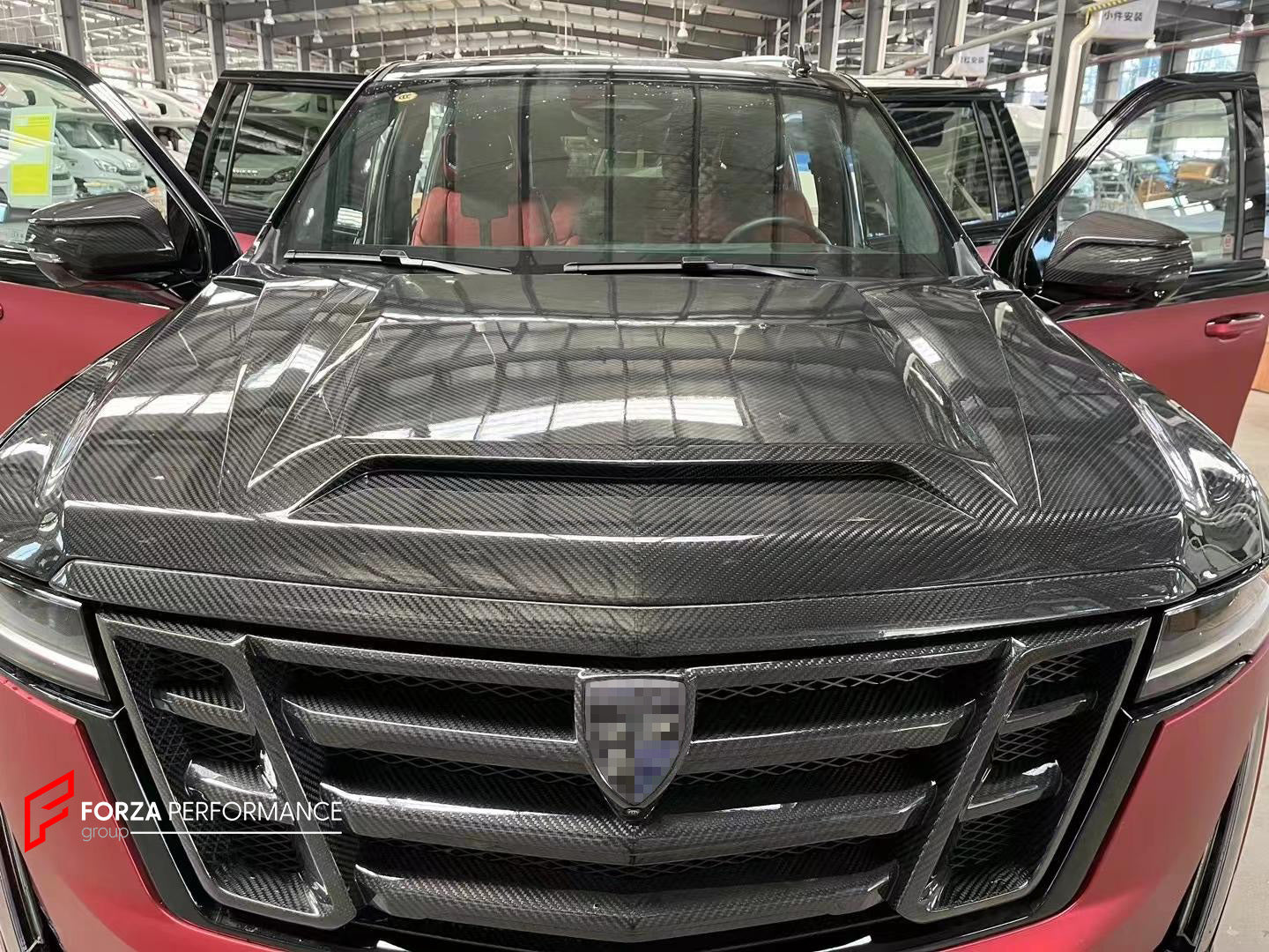 DRY CARBON BODY KIT for CADILLAC ESCALADE 2021 - 2024

Set includes:


Front Lip with Led DRL
Front Grille
Hood / Bonnet
Side Mirror Covers
Fender Flares

Roof Spoiler
Rear Diffuser

Material: Carbon Fiber

Note: Professional installation is required.
