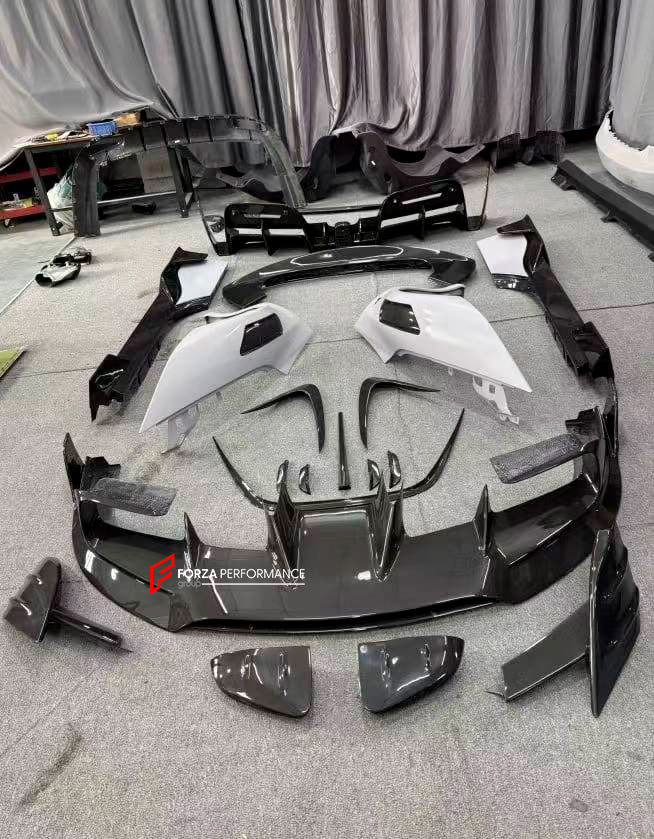 DRY CARBON BODY KIT for FERRARI SF90

Set includes:

Front Lip
Front Bumper Canards
Front Lid Trim
Front Fenders
Side Mirror Covers
Rear Air Vent Inlet Trim
Side Skirts
Rear Spoiler
Rear Diffuser

Material: Carbon Fiber

Note: Professional installation is required.