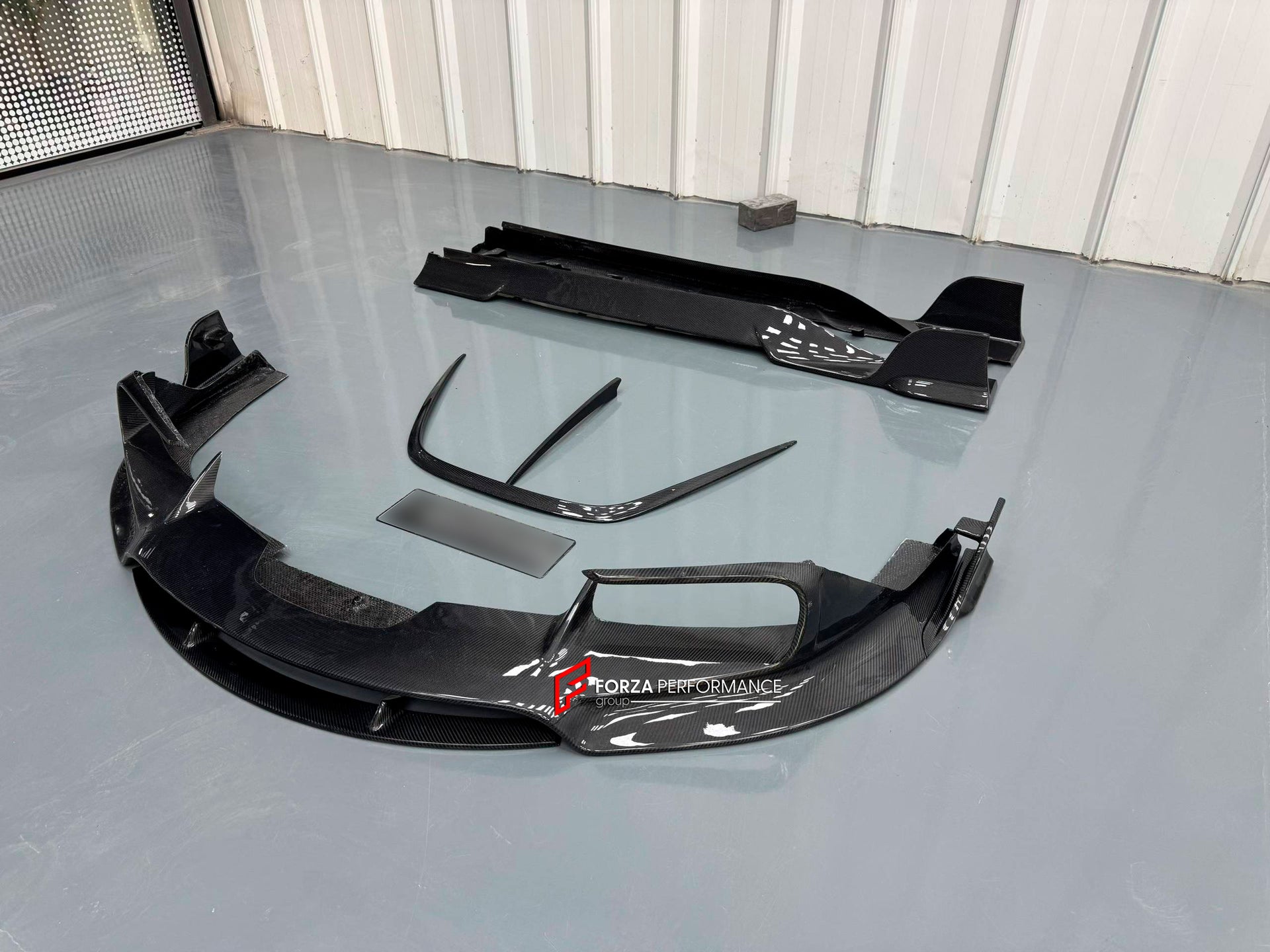 DRY CARBON BODY KIT for FERRARI SF90

Set includes:

Front Lip
Front Bumper Canards
Front Lid Trim
Front Fenders
Side Mirror Covers
Rear Air Vent Inlet Trim
Side Skirts
Rear Spoiler
Rear Diffuser

Material: Carbon Fiber

Note: Professional installation is required.
