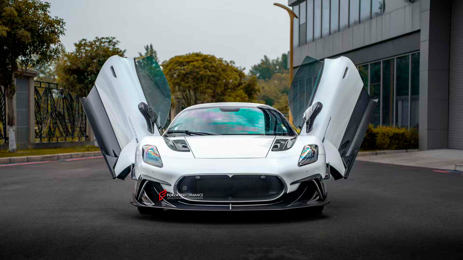 MANSORY STYLE DRY CARBON BODY KIT for MASERATI MC20 2020+

Set includes:


Front Lip
Front Bumper Trims
Front Canards
Hood / Bonnet
Hood Air Vents
Side Mirror Covers
Side Skirts
Rear Spoiler
Rear Diffuser

Material: Dry Carbon

Note: Professional installation is required.