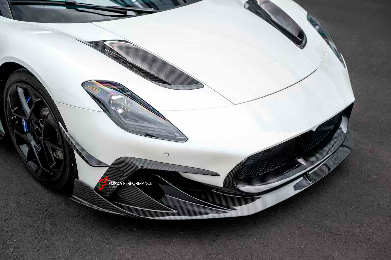 MANSORY STYLE DRY CARBON BODY KIT for MASERATI MC20 2020+

Set includes:


Front Lip
Front Bumper Trims
Front Canards
Hood / Bonnet
Hood Air Vents
Side Mirror Covers
Side Skirts
Rear Spoiler
Rear Diffuser

Material: Dry Carbon

Note: Professional installation is required.