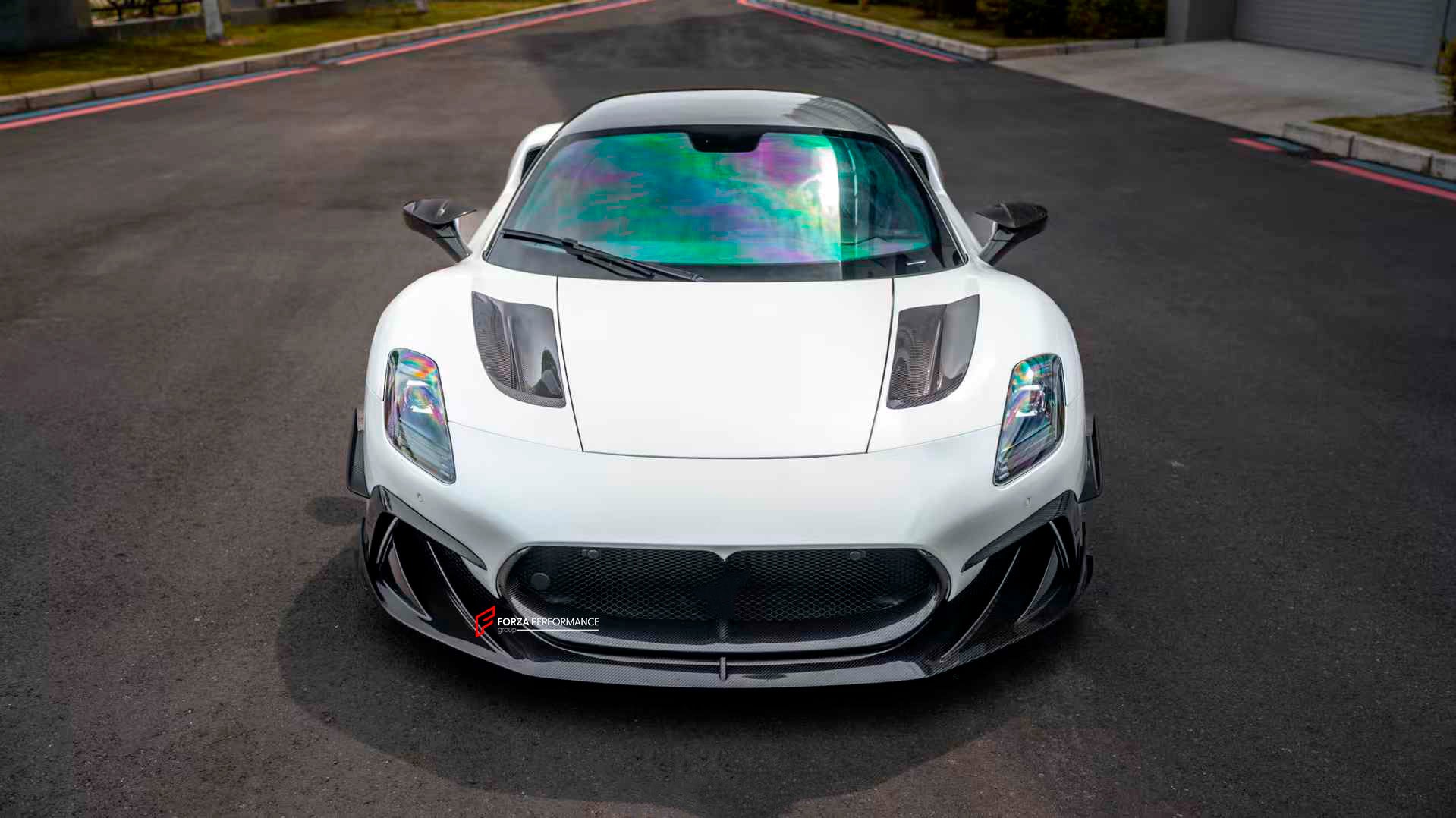 MANSORY STYLE DRY CARBON BODY KIT for MASERATI MC20 2020+

Set includes:


Front Lip
Front Bumper Trims
Front Canards
Hood / Bonnet
Hood Air Vents
Side Mirror Covers
Side Skirts
Rear Spoiler
Rear Diffuser

Material: Dry Carbon

Note: Professional installation is required.