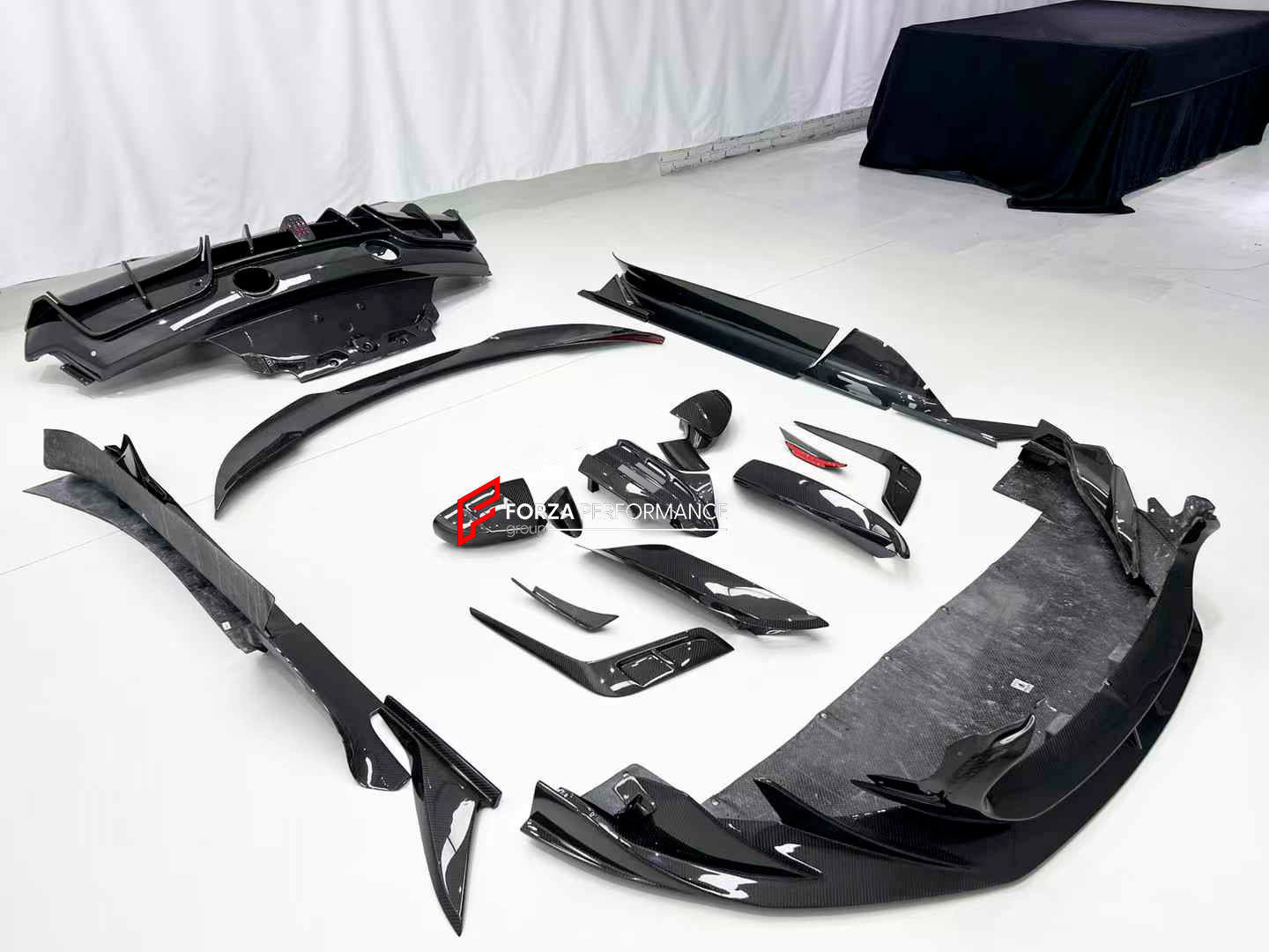 MANSORY STYLE DRY CARBON BODY KIT for MASERATI MC20 2020+

Set includes:


Front Lip
Front Bumper Trims
Front Canards
Hood / Bonnet
Hood Air Vents
Side Mirror Covers
Side Skirts
Rear Spoiler
Rear Diffuser

Material: Dry Carbon

Note: Professional installation is required.