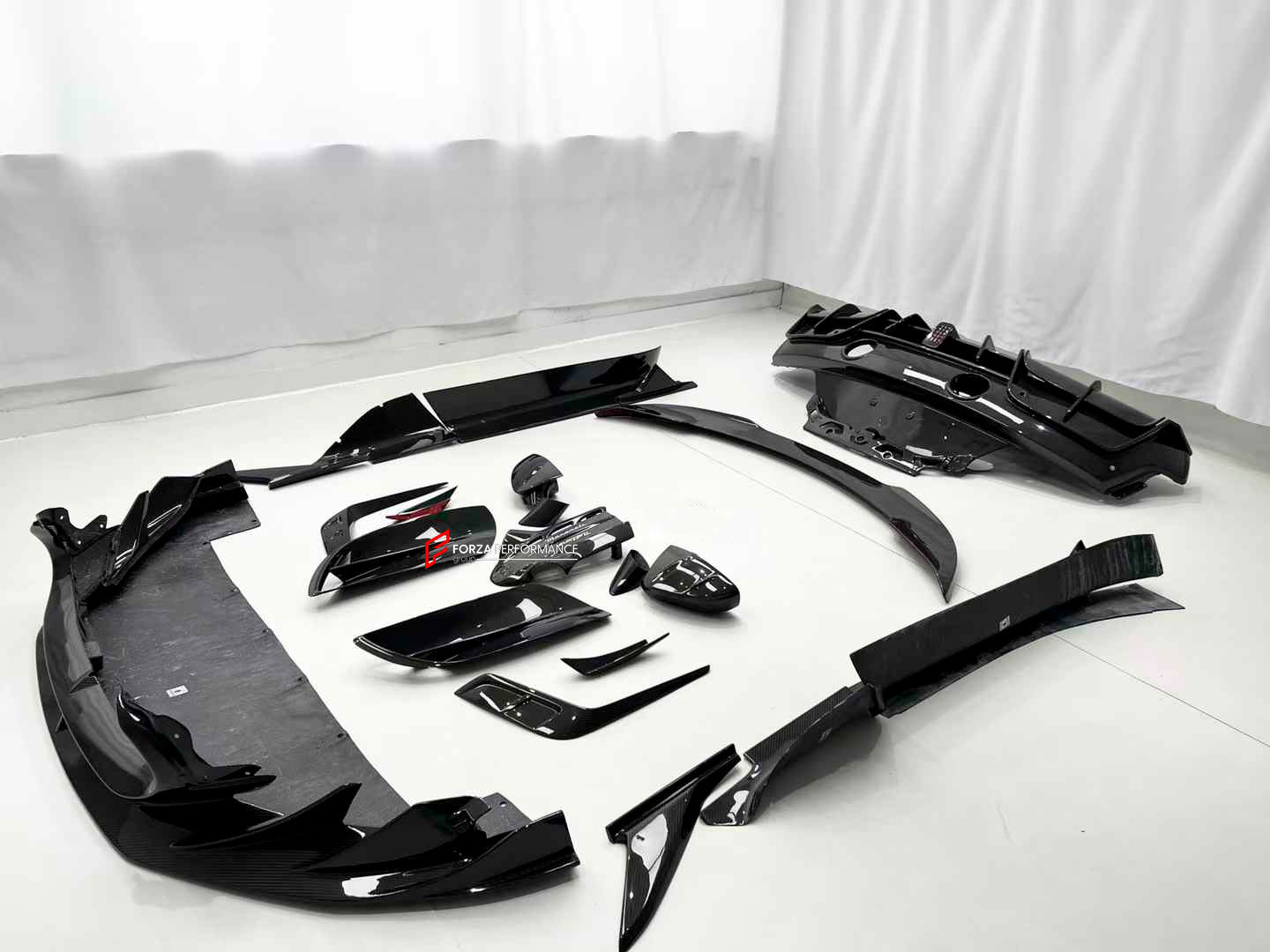 MANSORY STYLE DRY CARBON BODY KIT for MASERATI MC20 2020+

Set includes:


Front Lip
Front Bumper Trims
Front Canards
Hood / Bonnet
Hood Air Vents
Side Mirror Covers
Side Skirts
Rear Spoiler
Rear Diffuser

Material: Dry Carbon

Note: Professional installation is required.