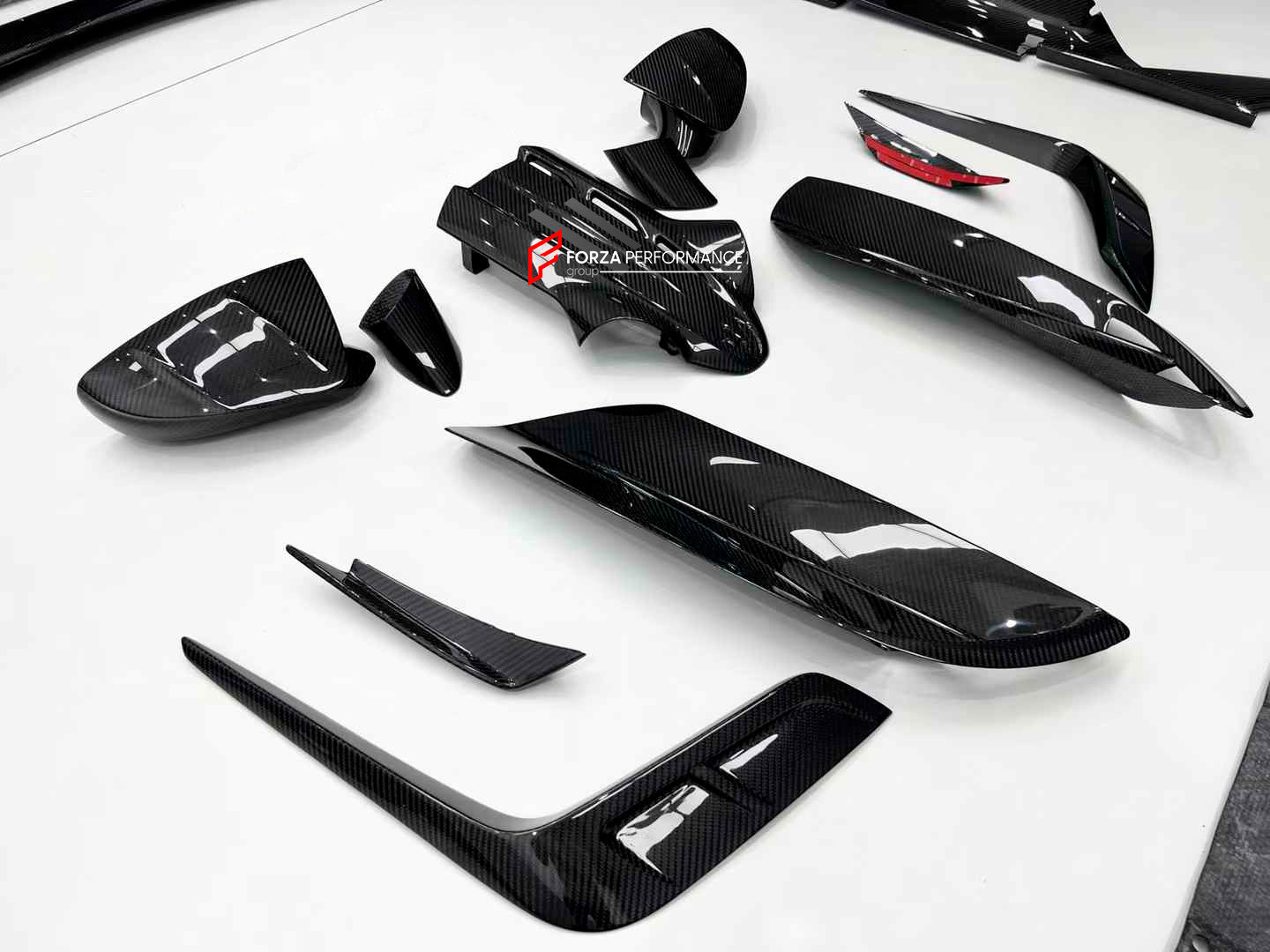 MANSORY STYLE DRY CARBON BODY KIT for MASERATI MC20 2020+

Set includes:


Front Lip
Front Bumper Trims
Front Canards
Hood / Bonnet
Hood Air Vents
Side Mirror Covers
Side Skirts
Rear Spoiler
Rear Diffuser

Material: Dry Carbon

Note: Professional installation is required.