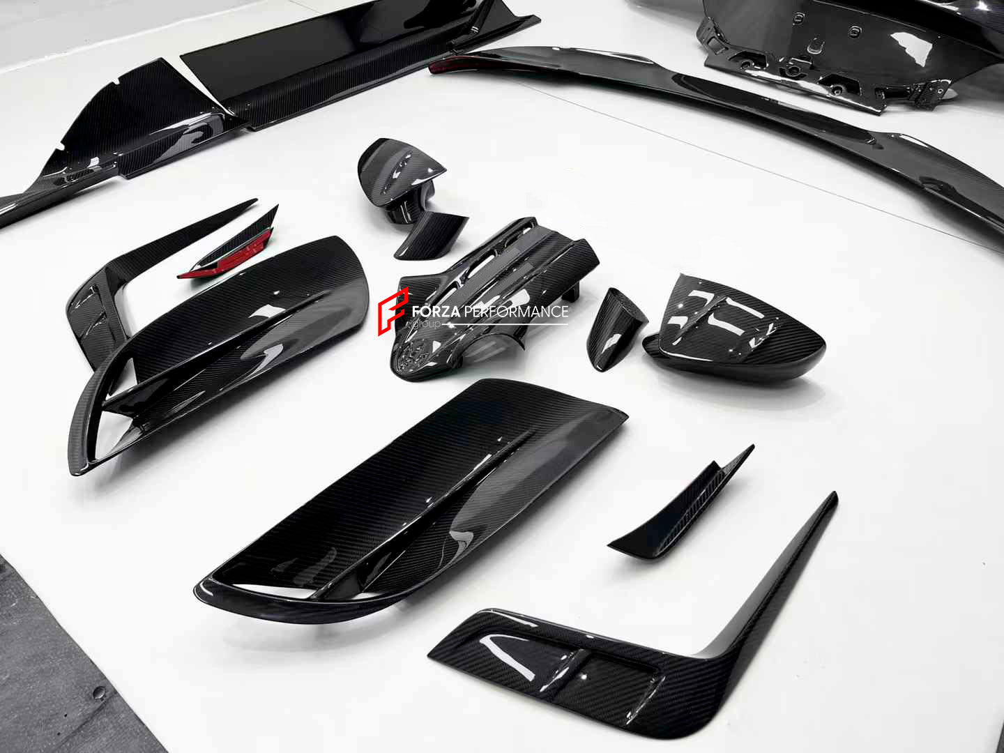 MANSORY STYLE DRY CARBON BODY KIT for MASERATI MC20 2020+

Set includes:


Front Lip
Front Bumper Trims
Front Canards
Hood / Bonnet
Hood Air Vents
Side Mirror Covers
Side Skirts
Rear Spoiler
Rear Diffuser

Material: Dry Carbon

Note: Professional installation is required.