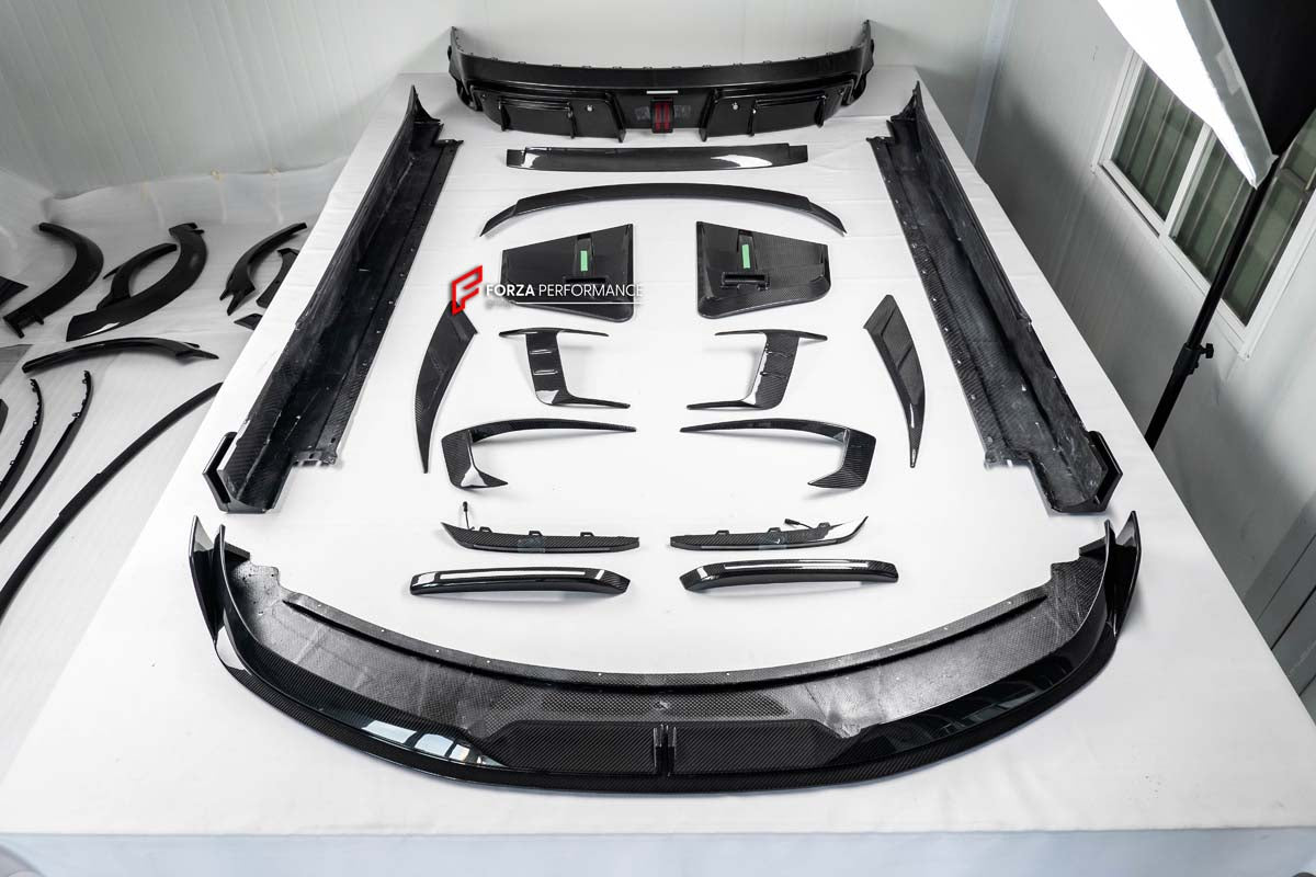  DRY CARBON FIBER BODY KIT for ROLLS ROYCE SPECTRE 2023+ 

Set includes:

Front Lip
Front Bumper Trims
Hood/Bonnet
Side Fender Vents
Side Skirts
Rear Spoiler
Rear Diffuser

Material: Carbon Fiber