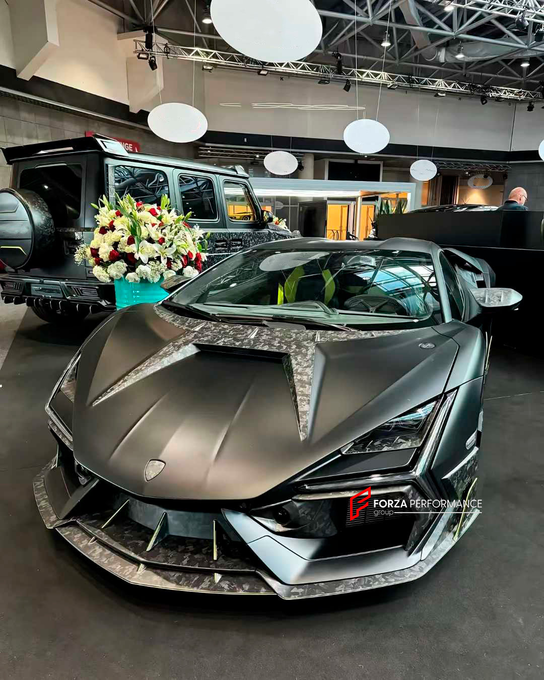 FORGED CARBON BODY KIT for LAMBORGHINI REVUELTO 2023+

Set includes:

Front Lip
Middle Air Splitter for Front Bumper
Air Splitter for Front Bumper
Front Radar Cover
Headlight Covers
Hood / Bonnet
Side Skirts

Rear Spoiler
Rear Diffuser

Material: Dry Carbon or Forged Carbon