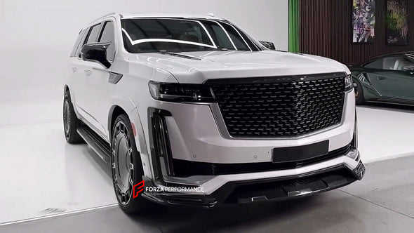 WIDE BODY KIT for CADILLAC ESCALADE 2021 - 2024

Set includes:


Front Lip
Front Bumper Trims
Grille Cover
Roof Spoiler 
Rear Diffuser 
Exhaust Tips

Material: Carbon Fiber

Note: Professional installation is required.

CONTACT US FOR PRICING&nbsp;

Payment ►
Visa
Mastercard
PayPal with a credit card (add 4.4% at checkout)
Payoneer
Cryptocurrency
Shipment ►
By express DHL/UPS/TNT/FedEx
To the local international airport
Special line by air
Special line by the sea
To Europe and the UK by train

Please let us