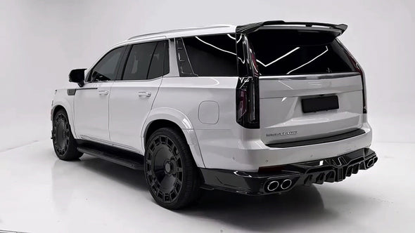 WIDE BODY KIT for CADILLAC ESCALADE 2021 - 2024

Set includes:


Front Lip
Front Bumper Trims
Grille Cover
Roof Spoiler 
Rear Diffuser 
Exhaust Tips

Material: Carbon Fiber

Note: Professional installation is required.

CONTACT US FOR PRICING&nbsp;

Payment ►
Visa
Mastercard
PayPal with a credit card (add 4.4% at checkout)
Payoneer
Cryptocurrency
Shipment ►
By express DHL/UPS/TNT/FedEx
To the local international airport
Special line by air
Special line by the sea
To Europe and the UK by train

Please let us